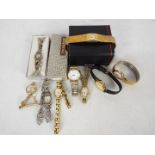 A collection of lady's wrist watches to