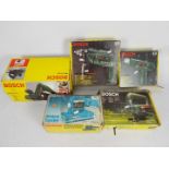 A collection of boxed Bosch power tools