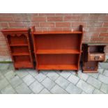 Three wall mounted shelving units and similar,