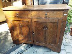 An art nouveau style sideboard, two draw