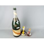 A vintage 35 cl bottle of Grand Marnier Cordon Jaune (seal intact),
