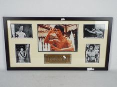 A framed Bruce Lee photograph montage wi