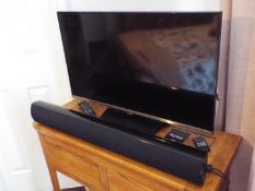 A Samsung 36 inch television # UE32H5000AKXXU, serial no ZCFK35JFB11576E version 04 with remote,