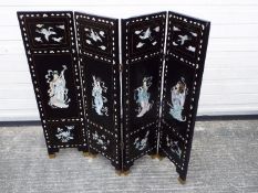 A four leaf, black lacquer screen decorated with birds and musicians, approximately 90 cm x 100 cm.