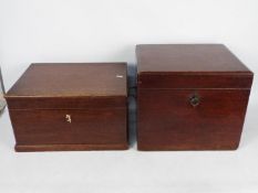 Two hinge lid wooden storage chests, largest approximately 33 cm x 40 cm x 35 cm.