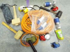 A collection of camping gear to include 3 mallets, 2 battery-powered camp lights,