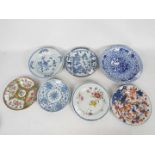 A collection of plates and dishes to inc