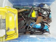 A mixed lot of DIY tools to include an orbital sander, 2 car axel stands a car battery charger,
