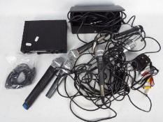 A Cam KWM1940 Wireless Microphone system and accessories.
