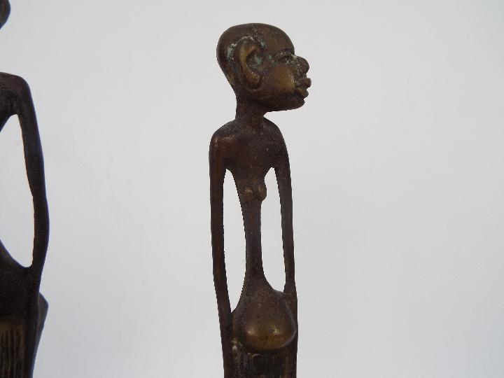 A pair of African bronze figures of slen - Image 2 of 8