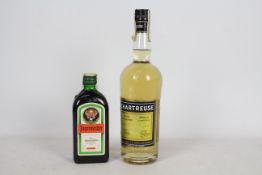A 75 cl bottle of Chartreuse and a 35 cl bottle of Jagermeister.