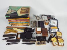 Lot to include children's annuals, cameras, plated salt and pepper pots, penknives,