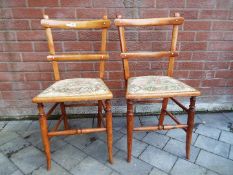 A matched pair of Edwardian chairs,