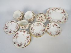 A collection of Minton tea wares in the