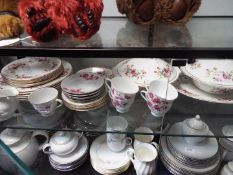 A collection of dinner and tea wares to include Royal Grafton Fine Bone China,