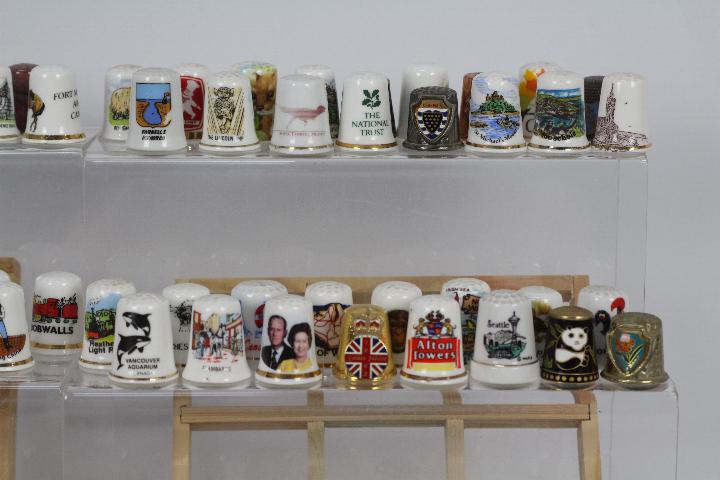 A collection of thimbles to include cera - Image 5 of 6