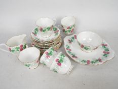 A quantity of Royal Albert tea wares in the Lucky Clover pattern.