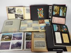A quantity of albums containing photogra