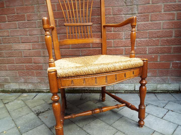 A rush seated light wood armchair - Image 2 of 3
