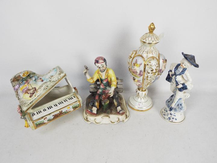 Four pieces of Capodimonte to include a