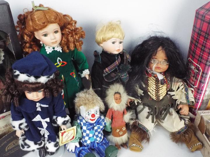 A collection of porcelain dressed dolls - Image 2 of 5