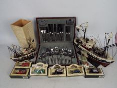 Two models of trawlers, largest 40 cm (l