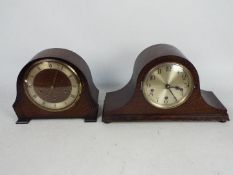 Two oak cased mantel clocks.