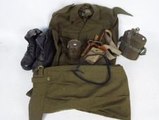 A quantity of military uniform and equipment.
