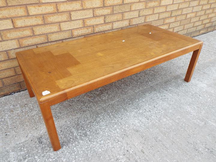 A Vejle Stole Mobelfabrik teak coffee table, approximately 40 cm x 135 cm x 65 cm.