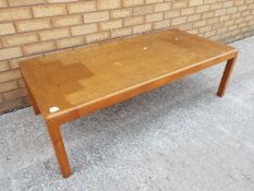 A Vejle Stole Mobelfabrik teak coffee table, approximately 40 cm x 135 cm x 65 cm.