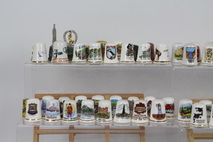 A collection of thimbles to include cera - Image 2 of 6