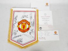 Manchester United Football Club - An officially issued Manchester United pennant with multiple