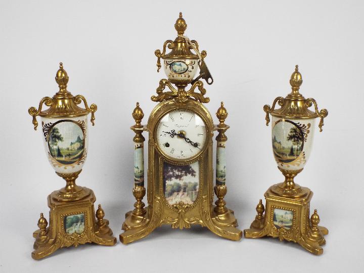 An Italian gilt brass and ceramic clock garniture, signed to the dial Imperial,