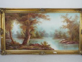 A large framed oil on canvas lakeside landscape scene, signed lower left I Cafieri,