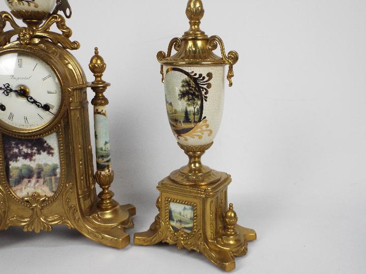 An Italian gilt brass and ceramic clock garniture, signed to the dial Imperial, - Image 7 of 10