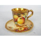 A Royal Worcester, fruit decorated cup and saucer,