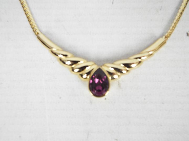 A Christian Dior gilt metal choker necklace with amethyst coloured glass stone, - Image 2 of 3