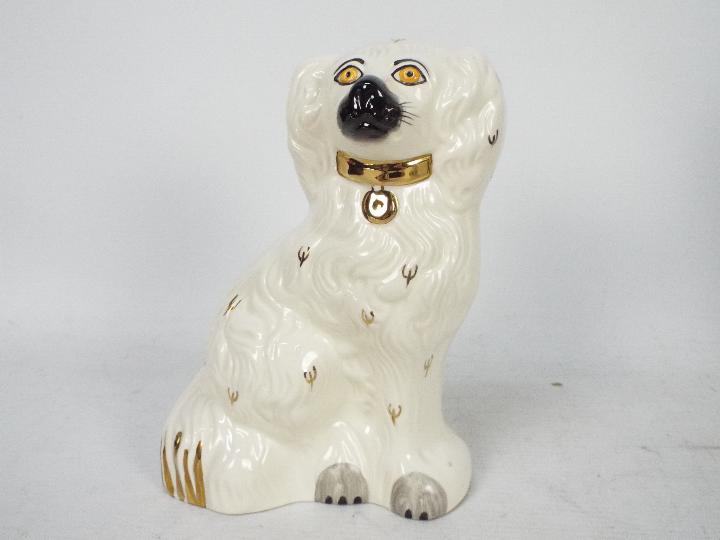 A boxed pair of Royal Doulton Staffordshire style seated spaniels, approximately 19 cm (h). - Image 5 of 8