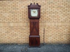 An early 19th century 8-day mahogany cased longcase clock, the case with ¾ length door,