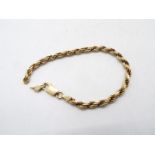 A 9ct gold bracelet (A/F), approximately 10.5 grams.