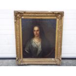 A framed oil on canvas portrait depicting a lady, unsigned, approximately 75 cm x 62 cm image size.