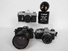 Photography - Cameras to include an Olympus OM10 with Olympus 1:1,8 / 50mm lens,