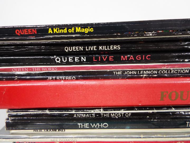 A collection of 12" vinyl records to include Queen, John Lennon, The Animals, The Who, David Bowie, - Image 2 of 6