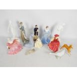 A collection of various ceramic figures to include Coalport, Lladro, Nao, Royal Doulton,