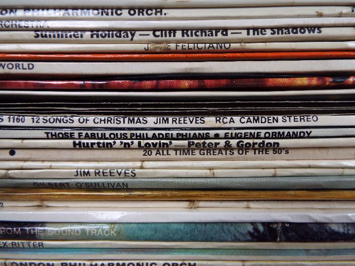 Three cases of vinyl records, 12" and 7", to include The Beatles, Duran Duran, Jona Lewie, - Image 5 of 12