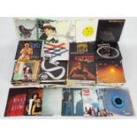 A collection of 7" vinyl records to include Kate Bush, David Bowie, Soft Cell, Rolling Stones,