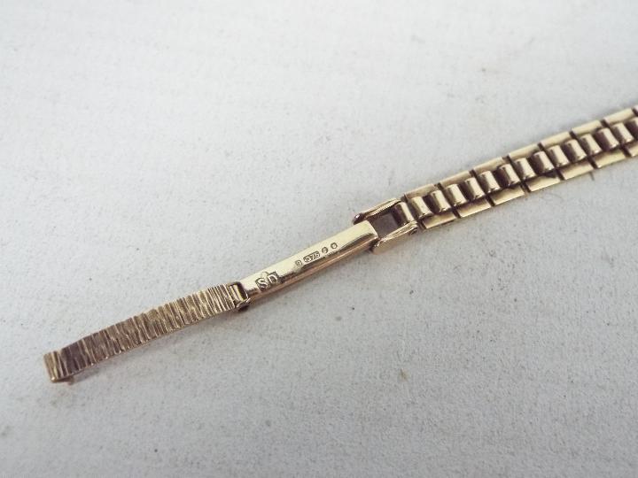 A lady's 9ct gold cased wrist watch with 9ct bracelet, 14.2 grams all in. - Image 3 of 4