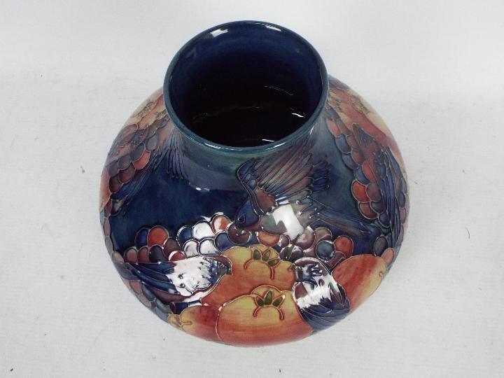 Moorcroft Pottery- a large squat baluster vase tubelined and hand painted in the pomegranate - Image 4 of 7