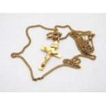 9ct gold - A yellow metal crucifix, stamped 375 and a 9ct gold chain, 40 cm (l), approximately 3.