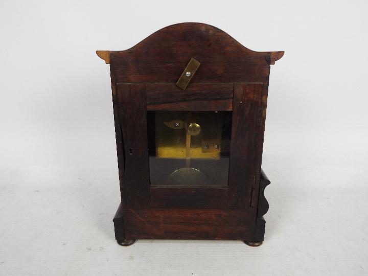 A mid-Victorian mantel clock, mahogany case with arched top and applied, - Image 4 of 5
